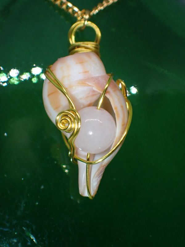 Small Welk Shell Wrapped in Gold Wire with Rose Quartz Bead on 20in Gold Chain