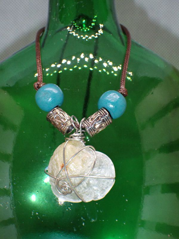 Jingle Shell Wrapped in Silver Wire with wooden and Metal Beads on 16 inch Brown Cord Necklace