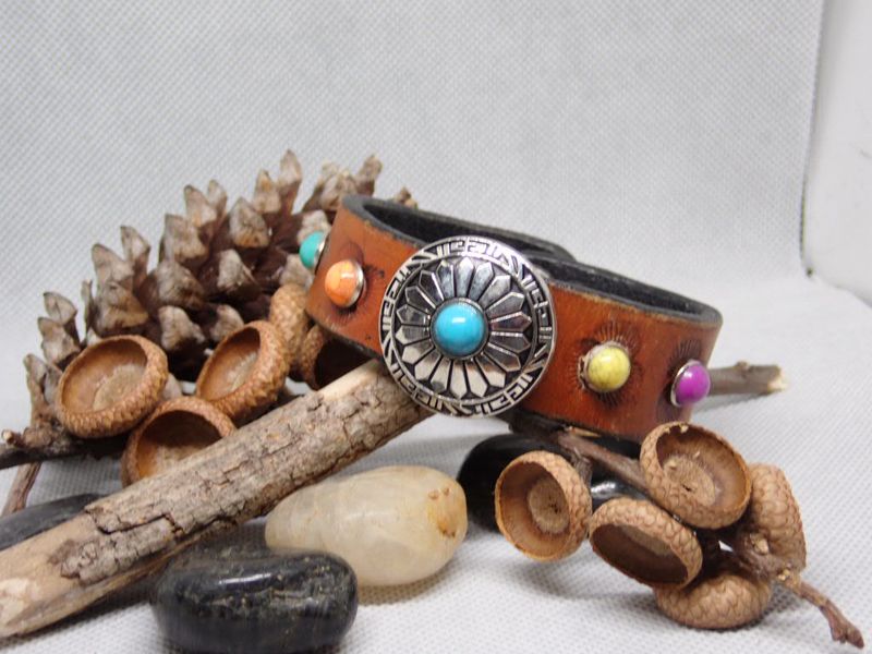 Wide leather cuff bracelet with turquoise and color accent stones