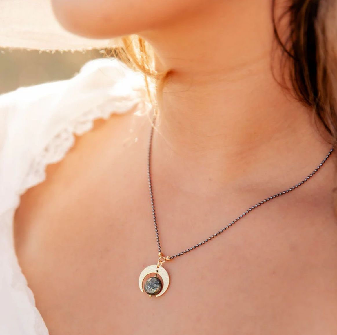 PYRITE QUARTER MOON NECKLACE