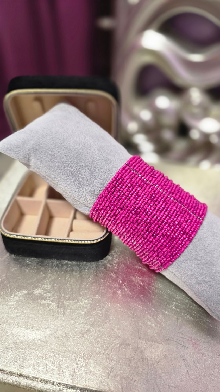 Pulsera bolitas fucsia