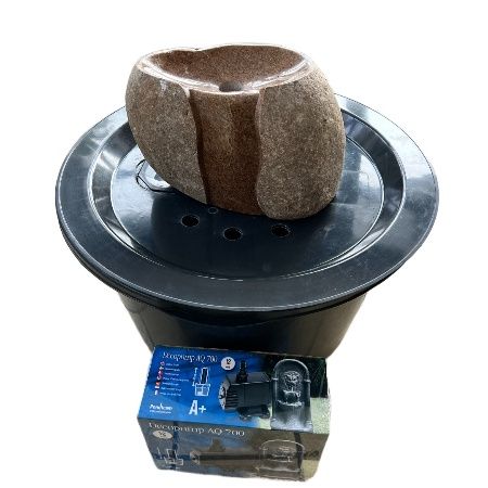 Vattensten putsad brun