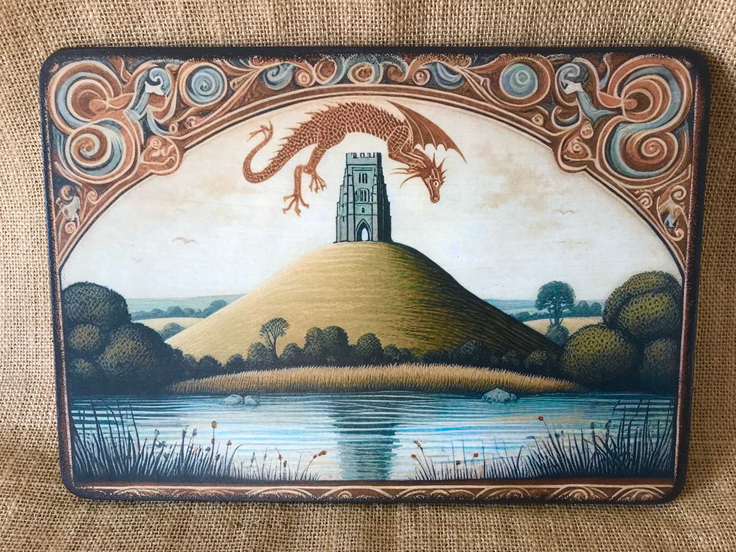 Medieval Dragon flying over Glastonbury Tor