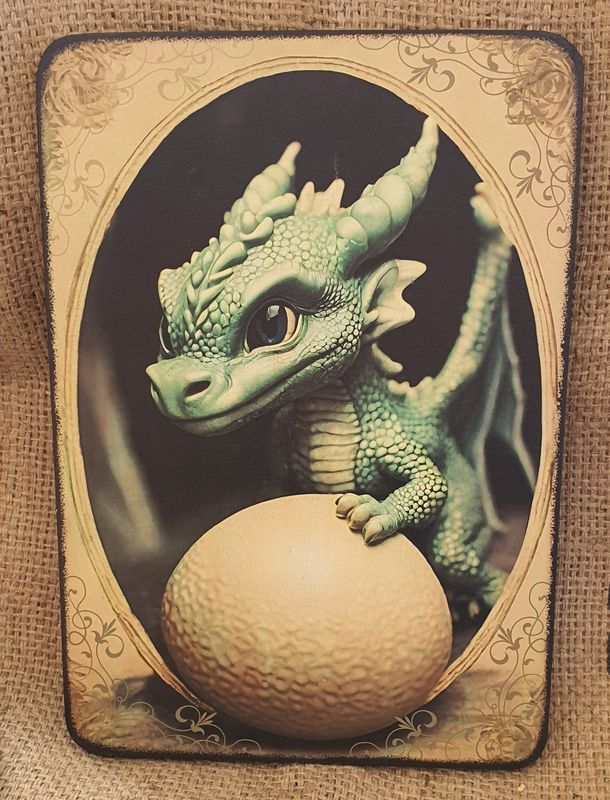 Vintage photo of a cute green baby Dragon