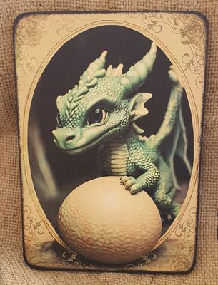 Vintage photo of a cute green baby Dragon