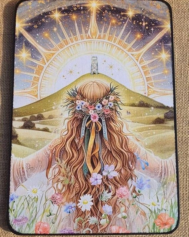 Spiritual girl looking towards Glastonbury Tor