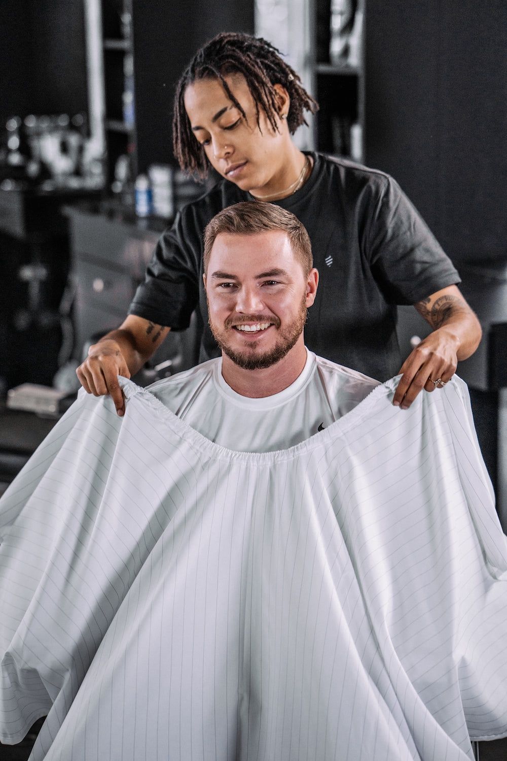 Barber strong the barber cape white with strip