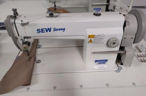 Sew Strong ("Straight Stitch Large Bobbin") Model SS-STLB with adjustable speed servo motor.