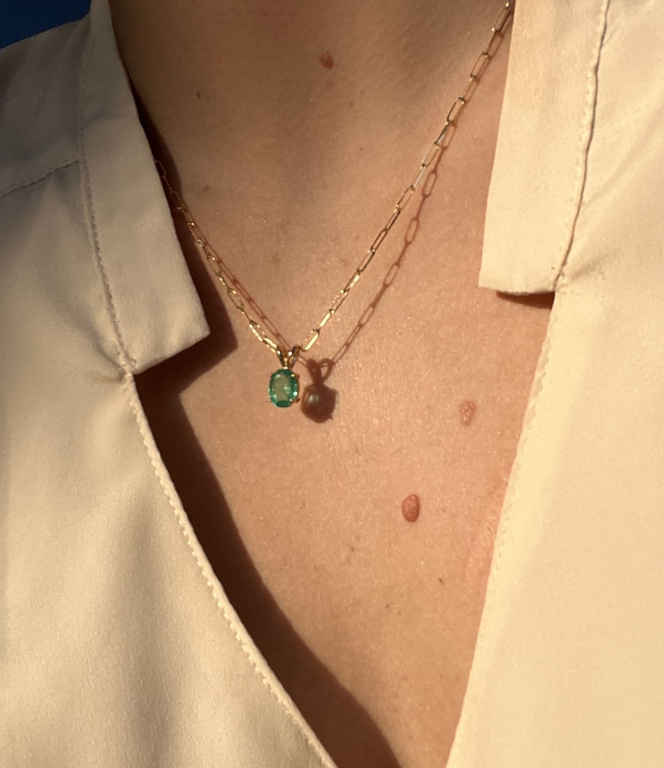 1.55CT oval Emerald pendant on 14kt YG setting
