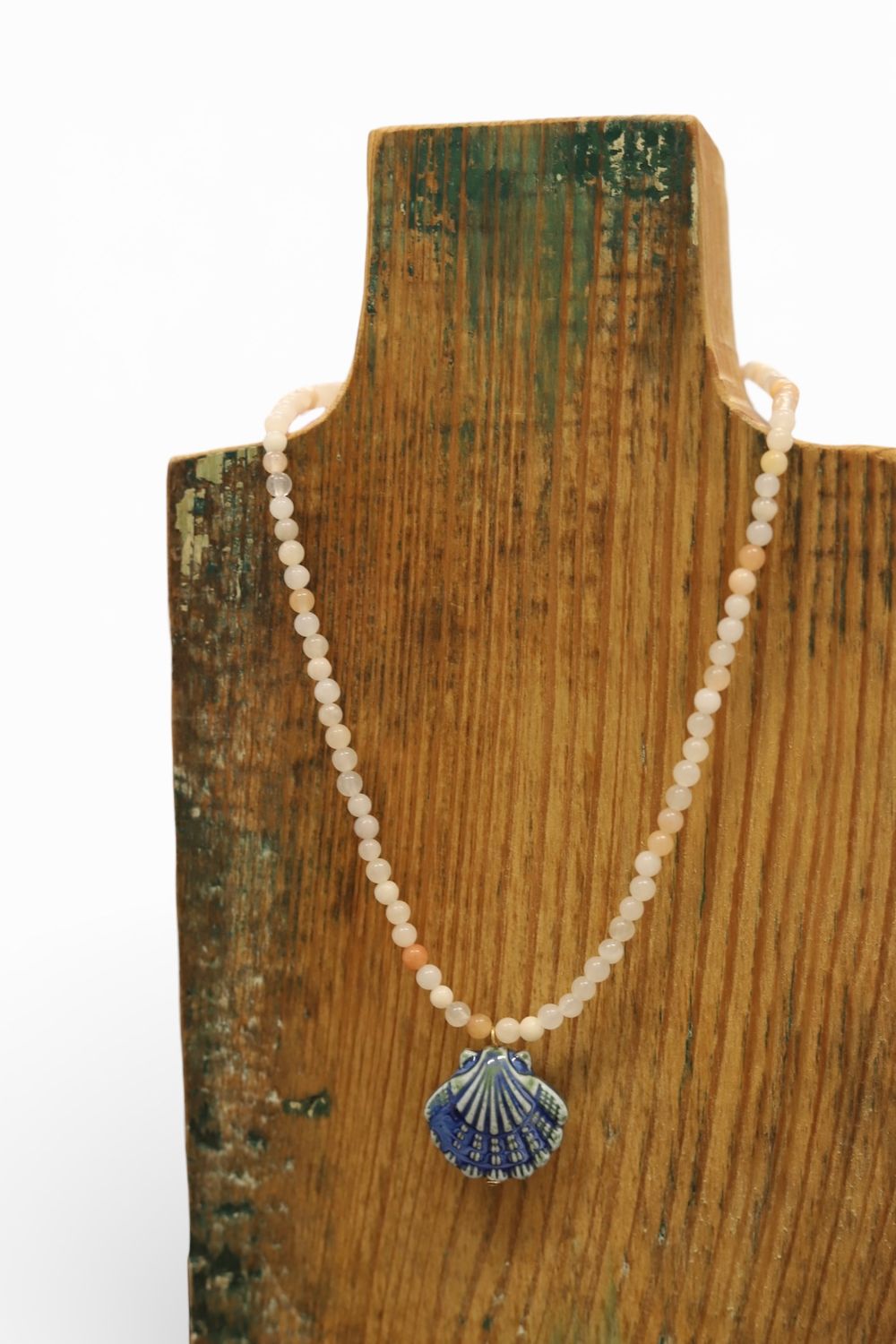Lola Pottery Shell Necklace: Sand with Blue Shell