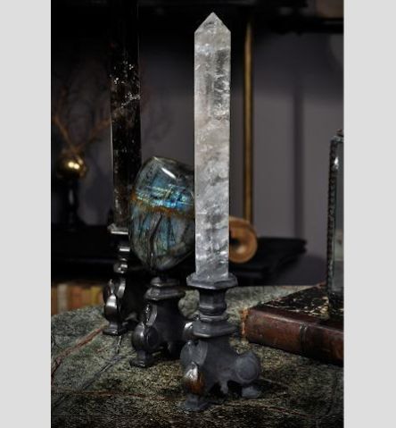 THIN CRYSTAL ON BLACK BRASS