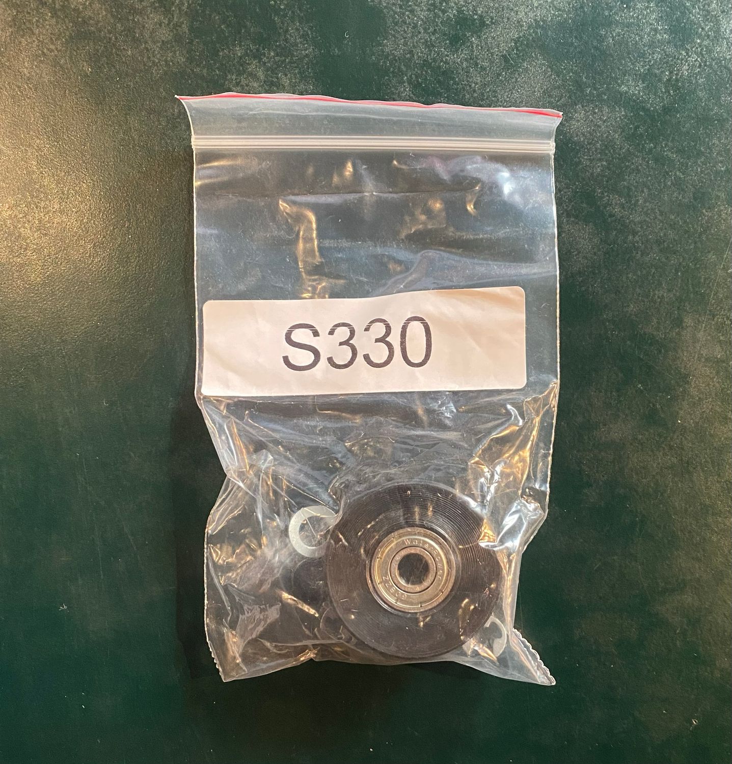 WATERROWER LOAD WHEEL ASSEMBLY