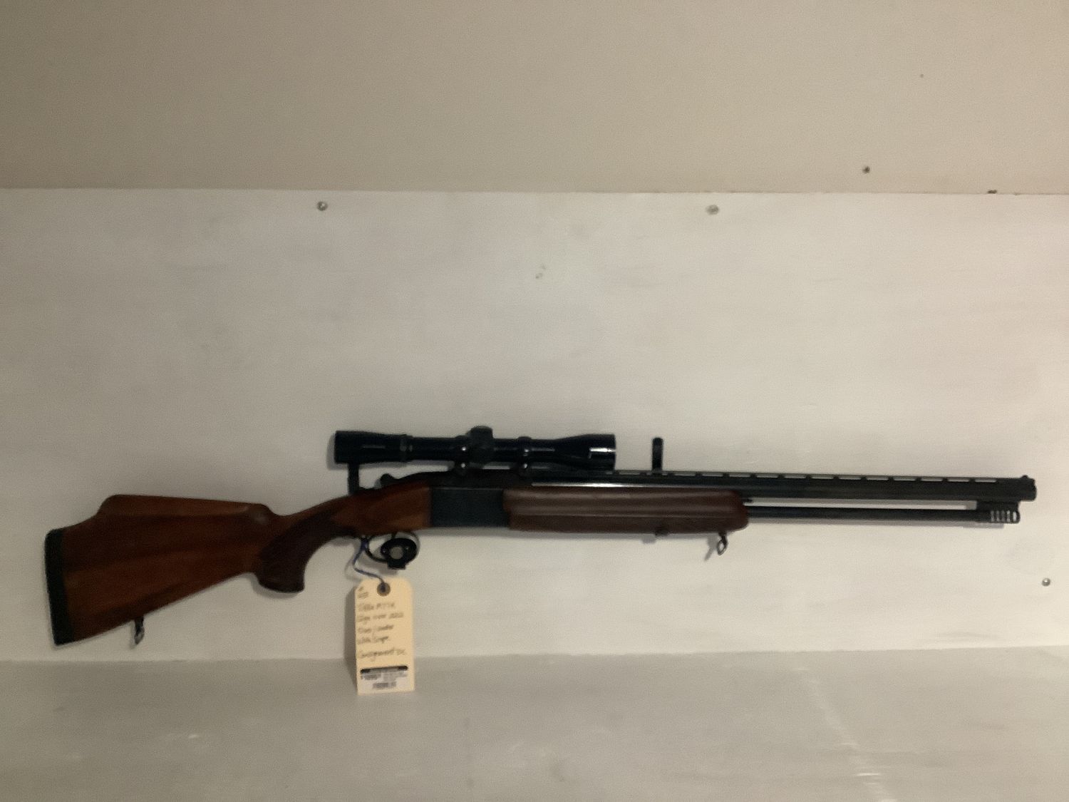 Tikka M77K 12ga over 222 rem Comes with scope