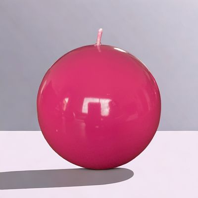 Bougie ronde fuchsia vernie