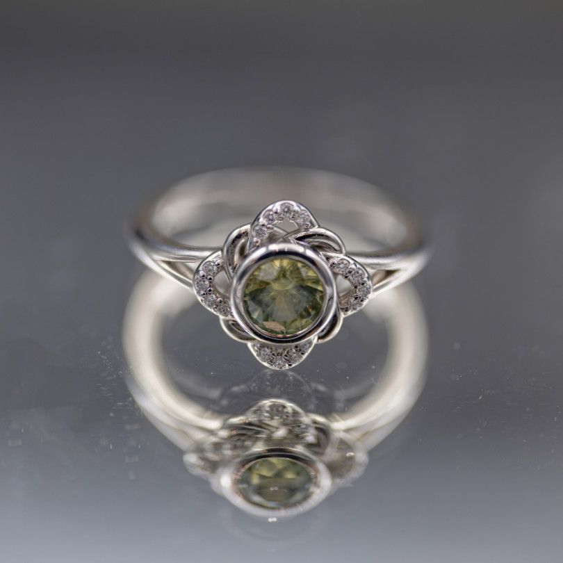 10k White Gold   .70ct Round Montana Sapphire   .08Ctw Pave Diamonds
