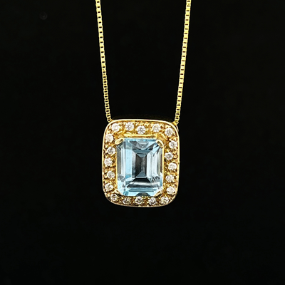 14k Yellow Gold 1ct Emerald Cut Blue Topaz w/.20tw Diamond Halo Necklace