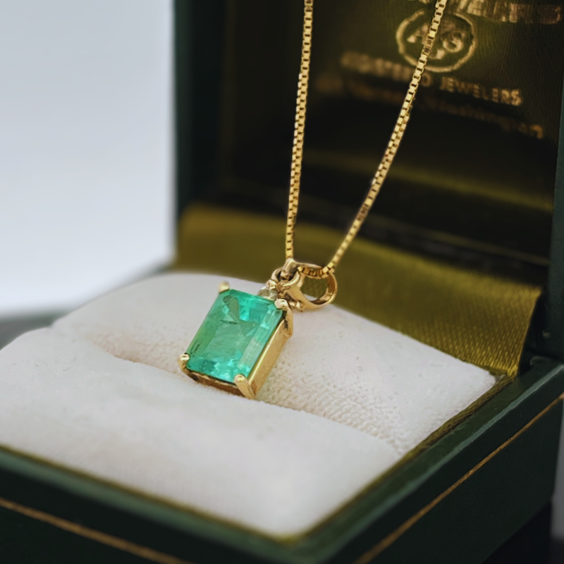 Pre-loved 14k YG 9x7mm Genuine Emerald Pendant w/ Diamond Accent