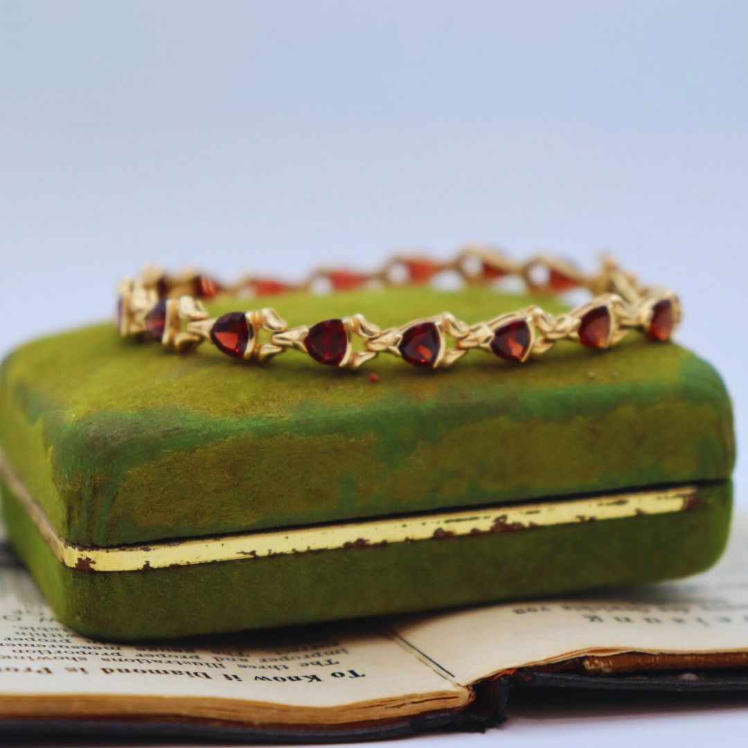 Pre-loved 14k YG Trillion Shape Garnet Fashion Bracelet