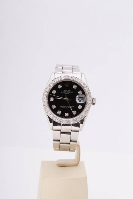Ladies Rolex Stainless Steel Black Diamond Dial