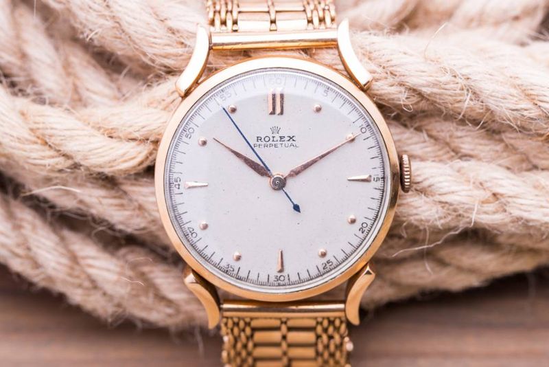 Rolex Gold Perpetual White Dial
