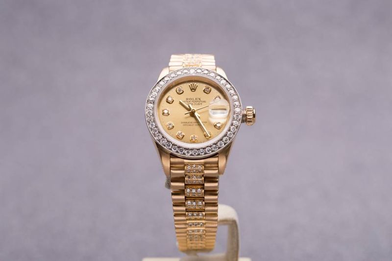 Ladies Rolex Gold Diamond Dial and Bezel Datejust