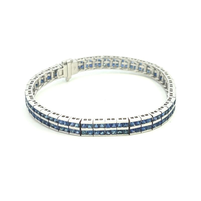 CON 18KWG DOUBLE ROW SAPPHIRE TENNIS BRACELET APPROX 6.02 CTW 7 INCHES