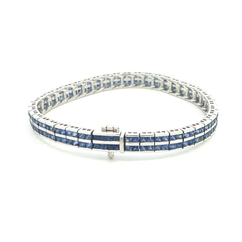 CON 18KWG DOUBLE ROW SAPPHIRE TENNIS BRACELET APPROX 6.02 CTW 7 INCHES
