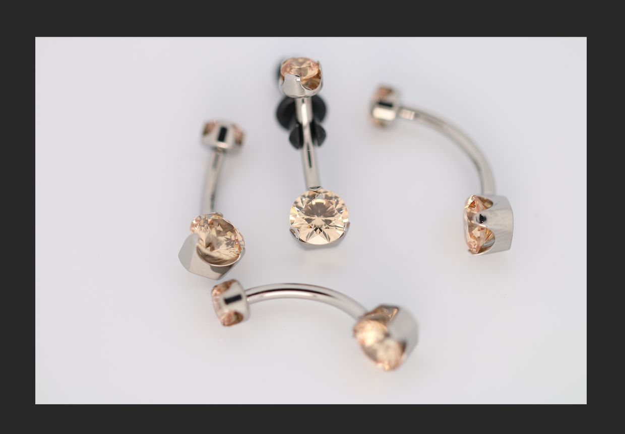 14g 5/16 brilliant cut round champagne prong set navel curve