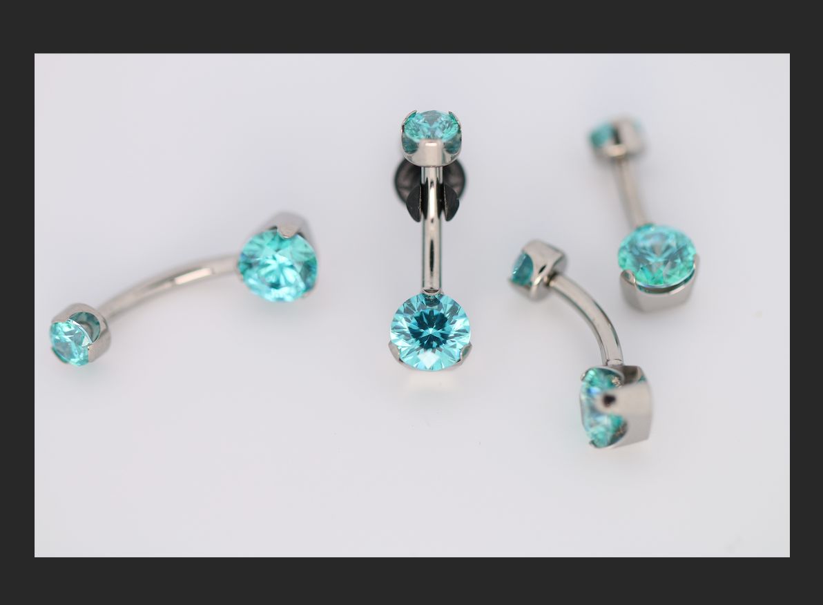 14g 3/8 brilliant cut round mint green prong set navel curve