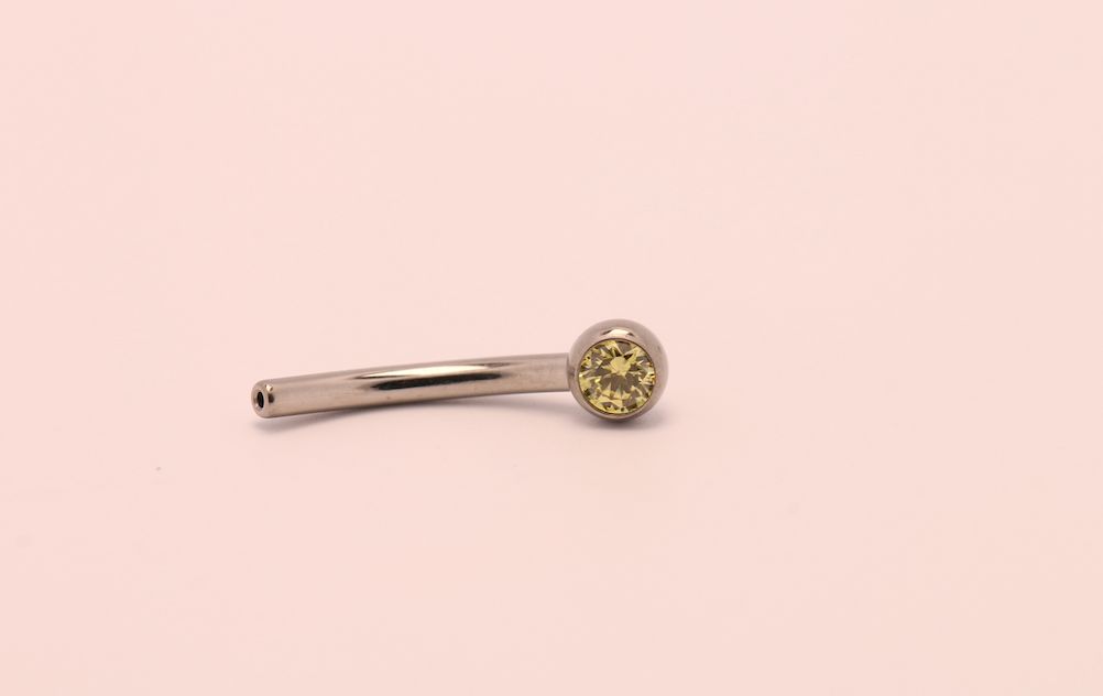 16g 3/8 side gem curved barbell shaft yellow ceramic