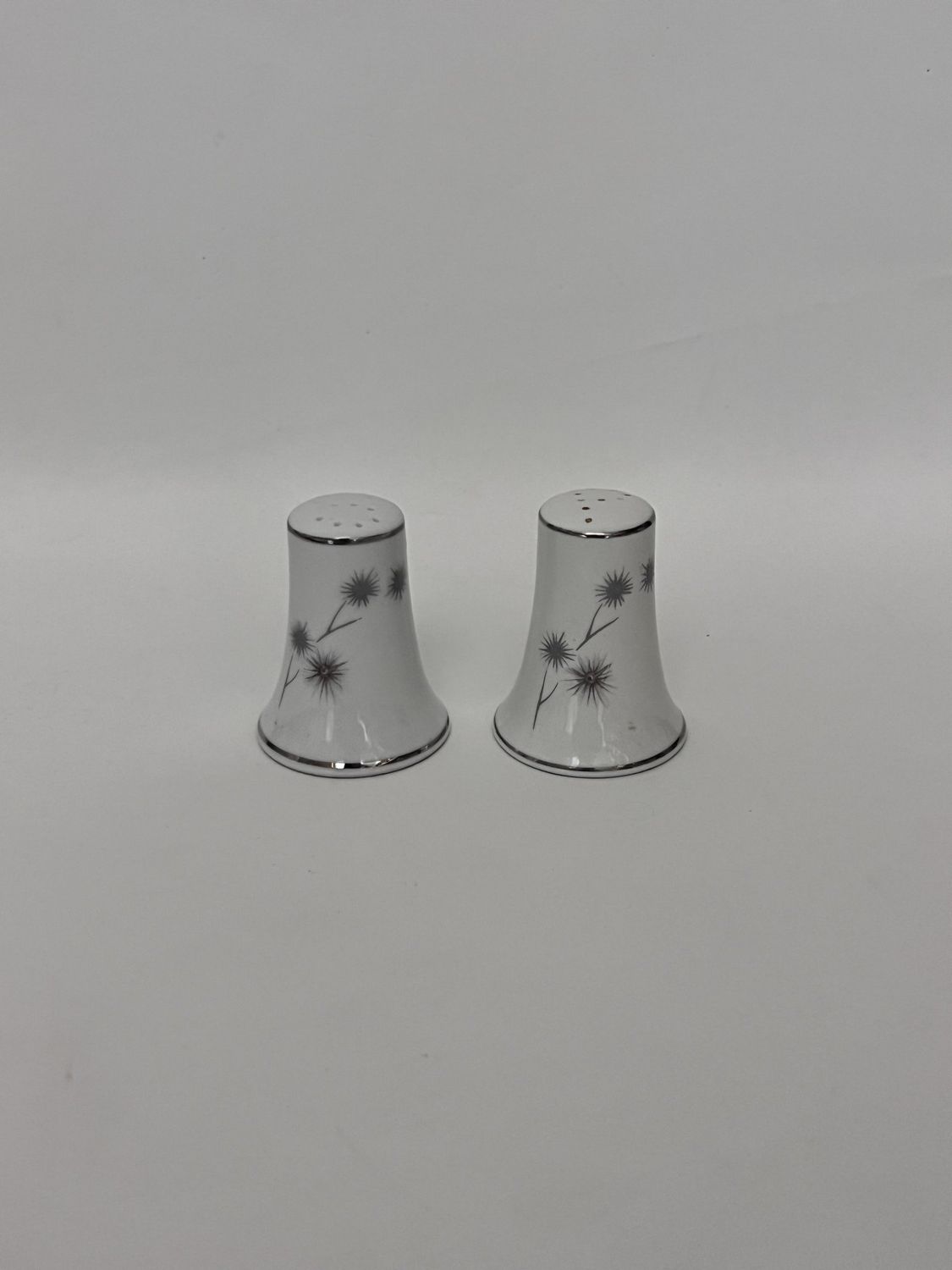 PLATINUM STAR BURST SALT AND PEPPER SET 2 1/4"