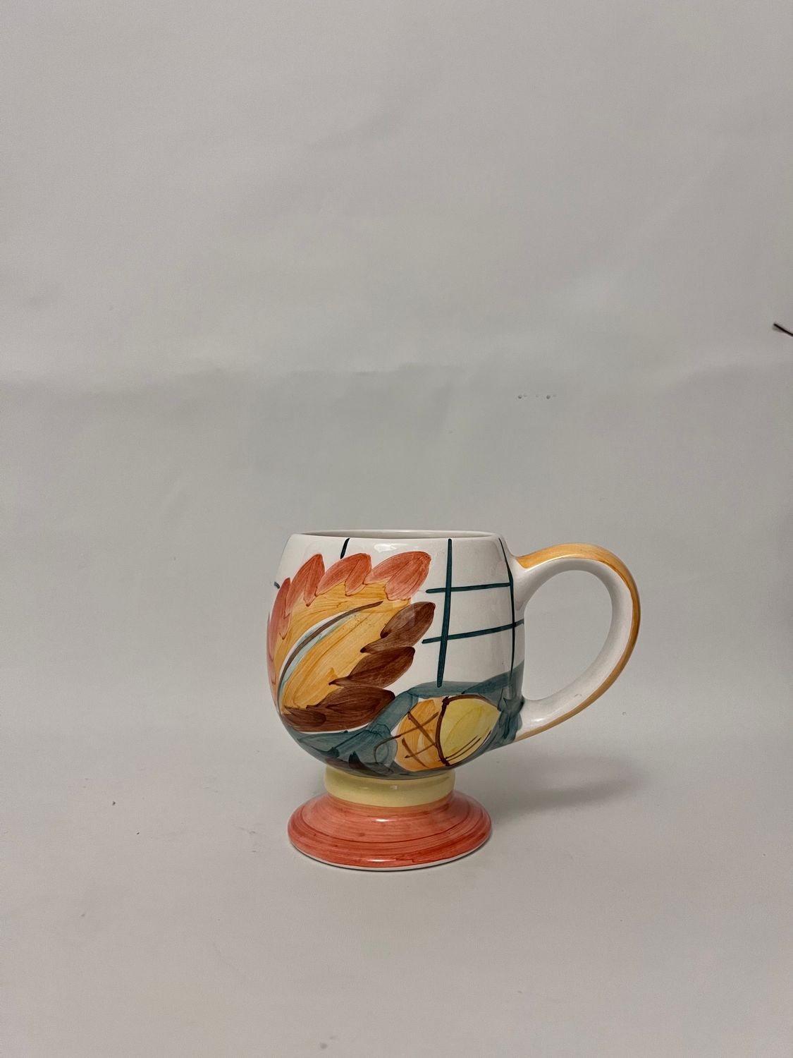 LEAF AND ACORN FOOTED MUG   5"