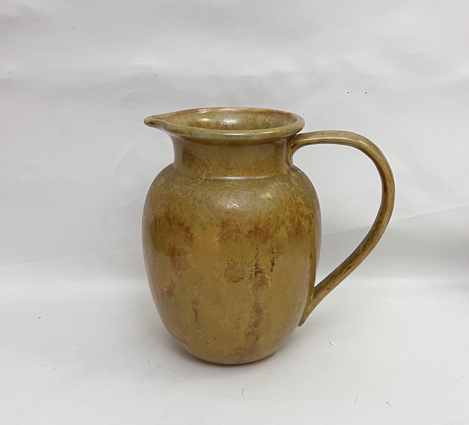 BROWN STONEWARE GLAZED PITCHER