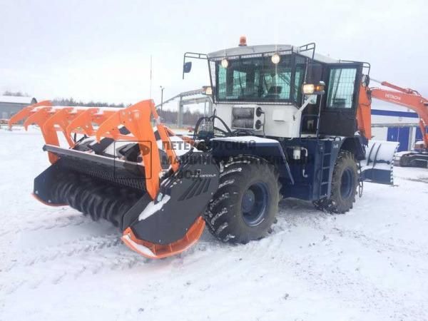 Трактор К-705 для работы с мульчером и дорожной фрезой