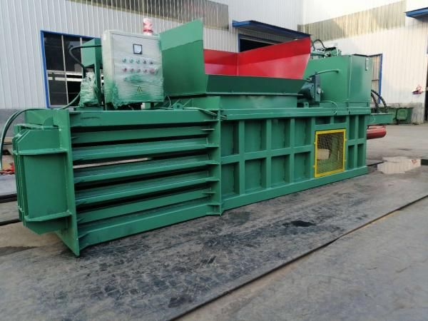 Пресс горизонтальный 60 тонн для макулатуры, пластика, ткани MHP-009xM1