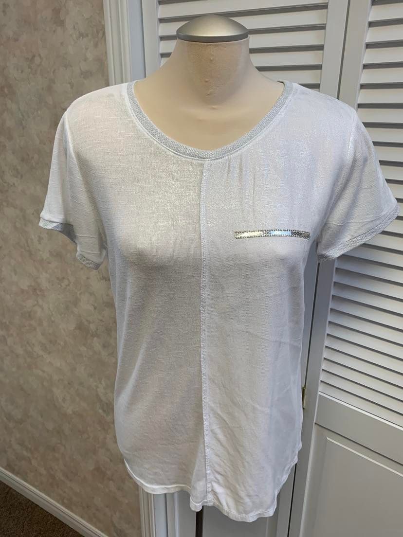 White t with silver applique