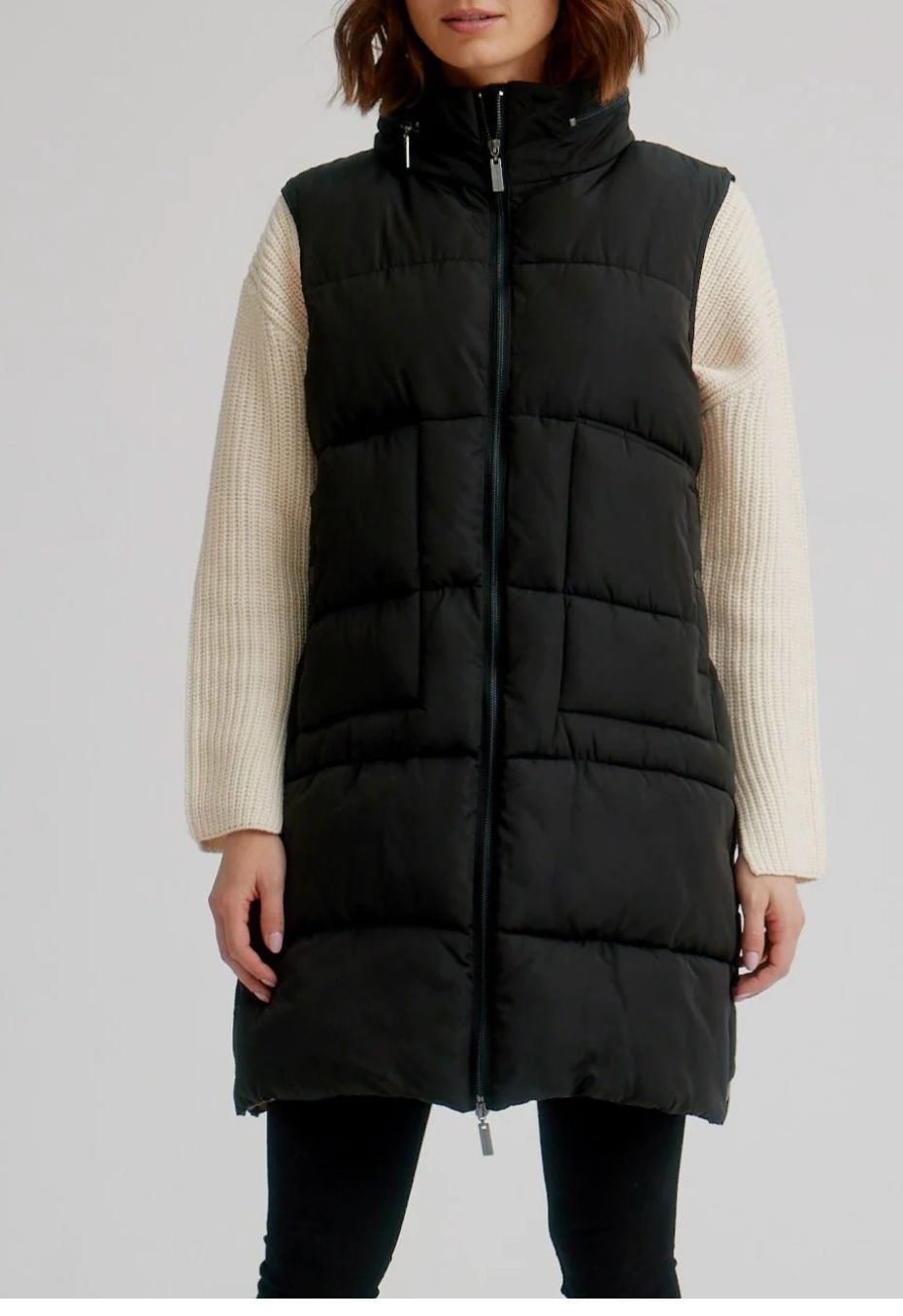 Black long puffer vest with gold hardware