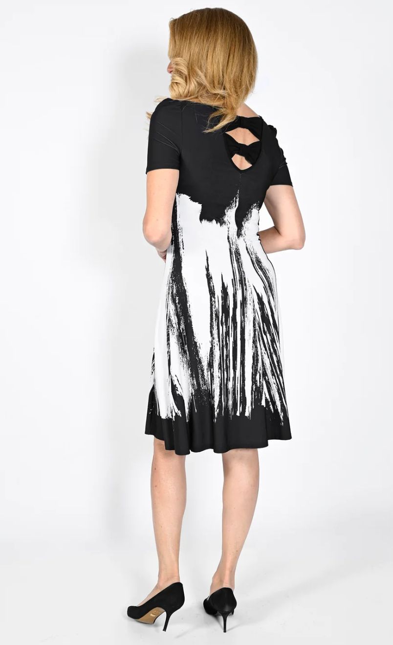 Black/ white print dress with sleeve and bow back detail