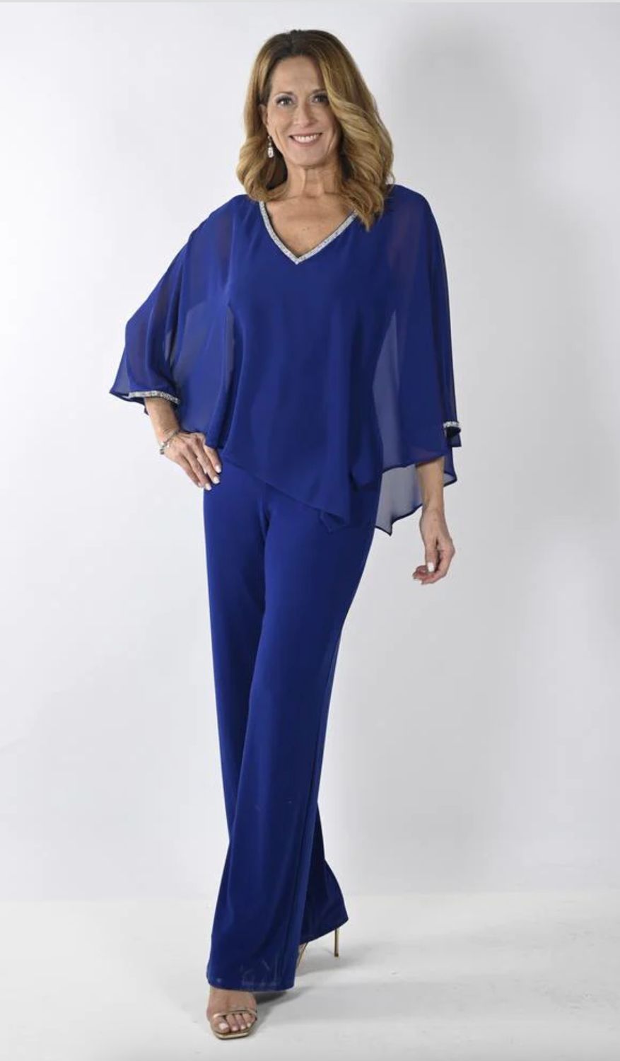 Imperial blue jumpsuit with a chiffon rhinestone trim overlay