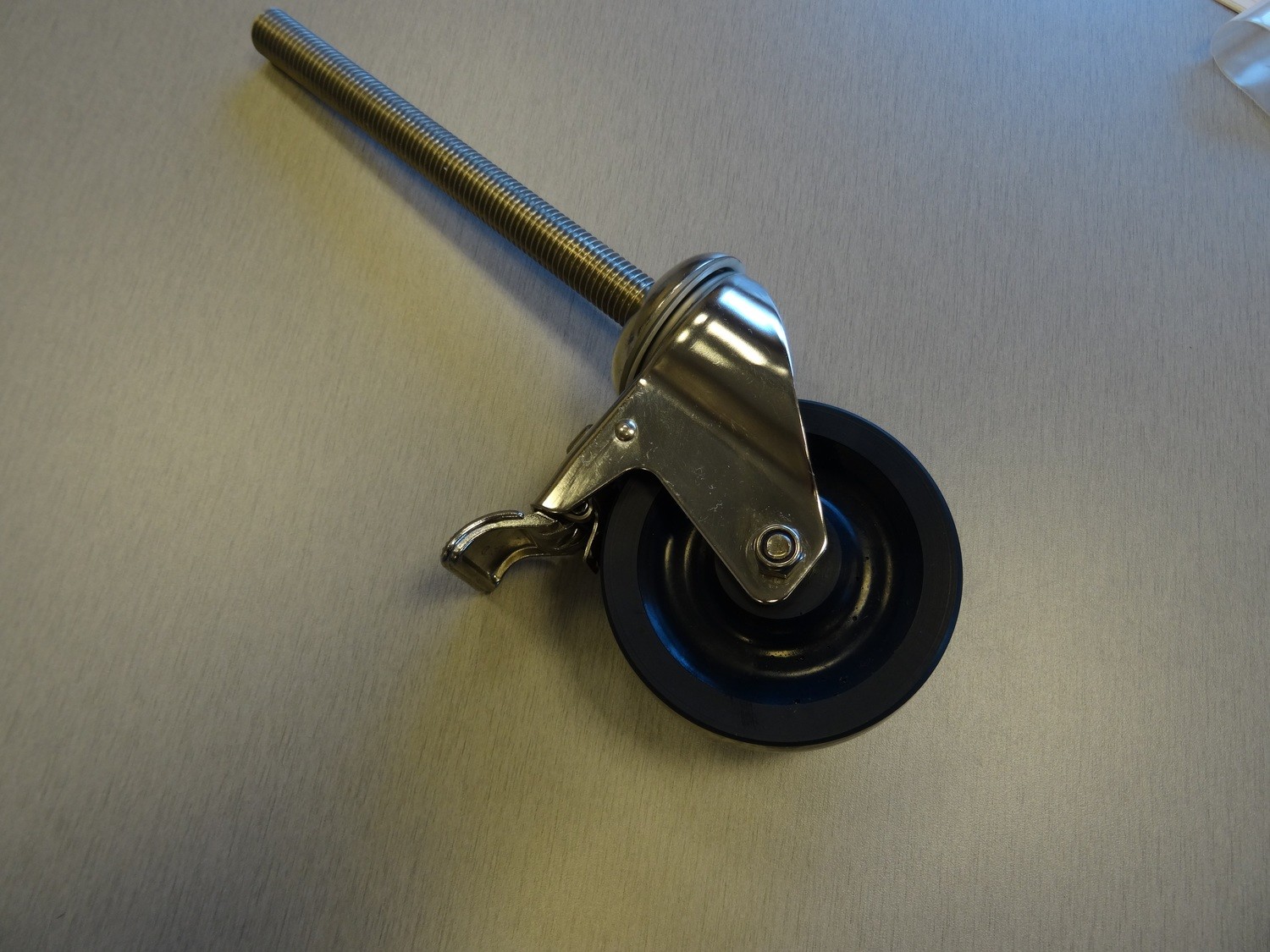 SWIVEL TOTAL LOCKING CASTER