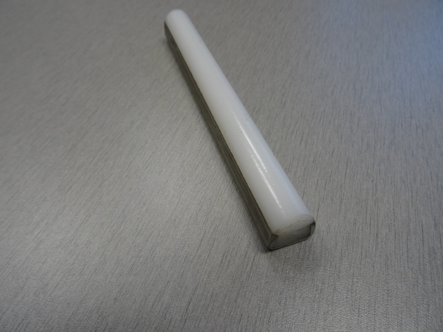 HALF ROUND STAINLESS BACKED GUIDE RAIL