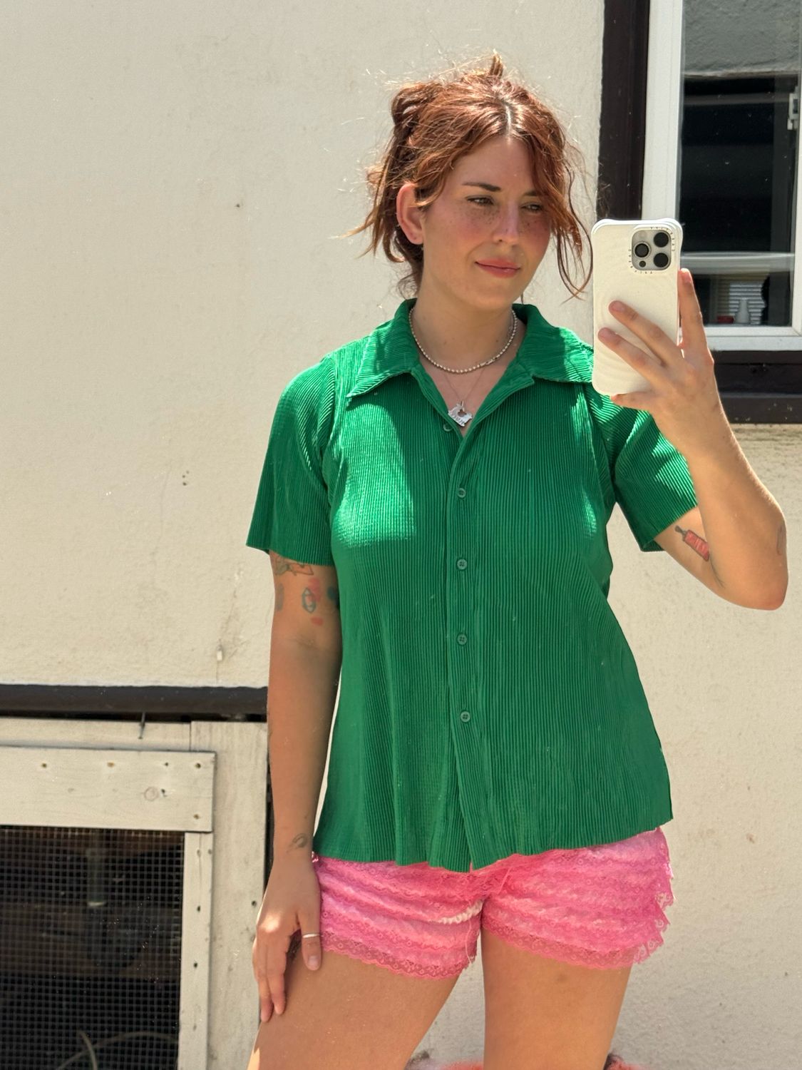 green ribbed blouse