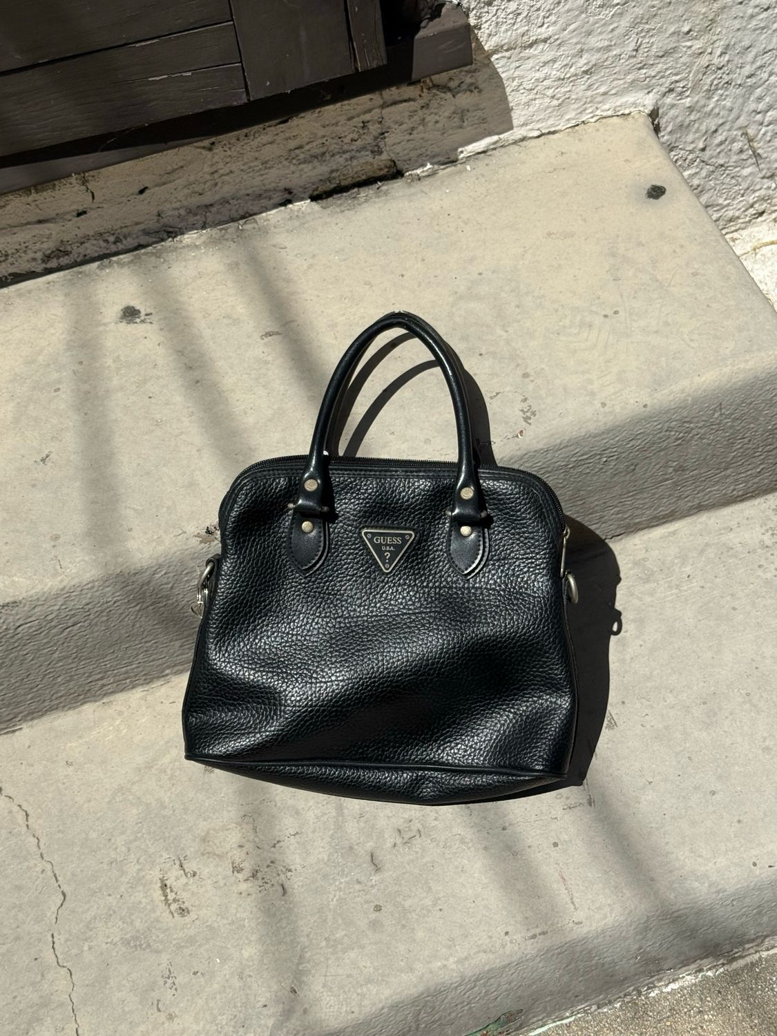 guess black pebbled dome satchel