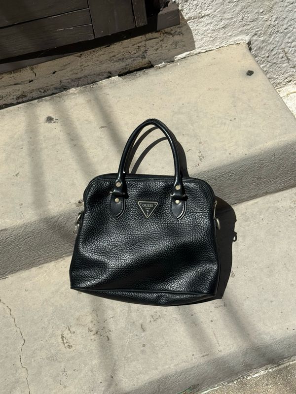 guess black pebbled dome satchel