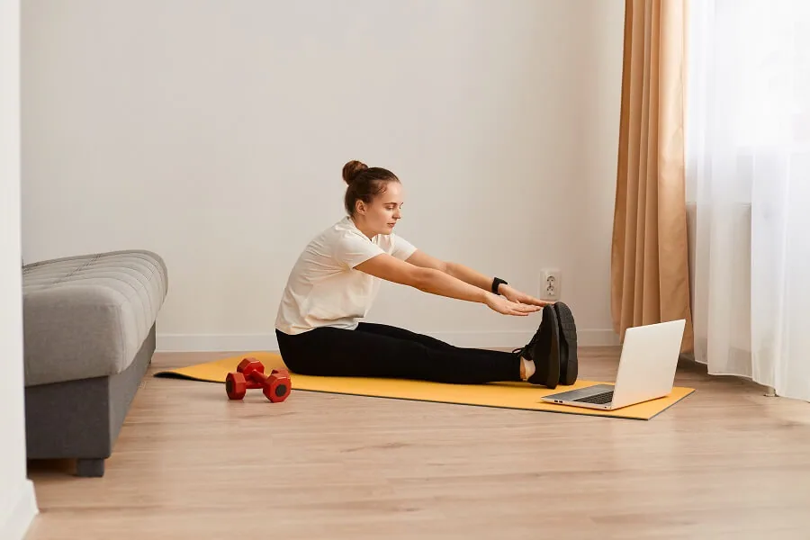Woman Stretches Legs Woman Stretches Legs