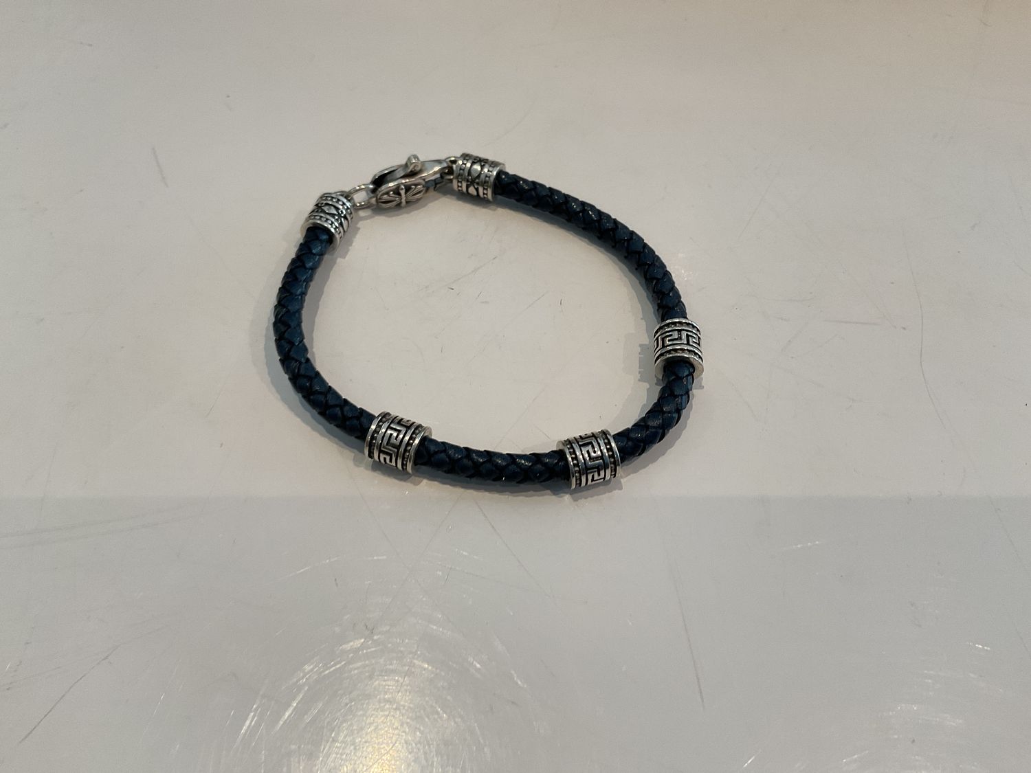 Bracelet, Navy Braided Leather, 3 Sterling Rondelles