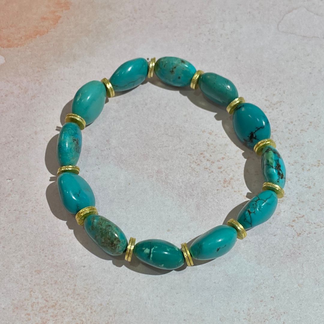 Turquoise Bracelet with Gold Plated Disc Accents