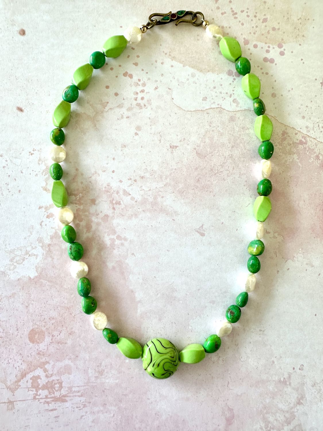 Bright Greens and Pearl Necklace