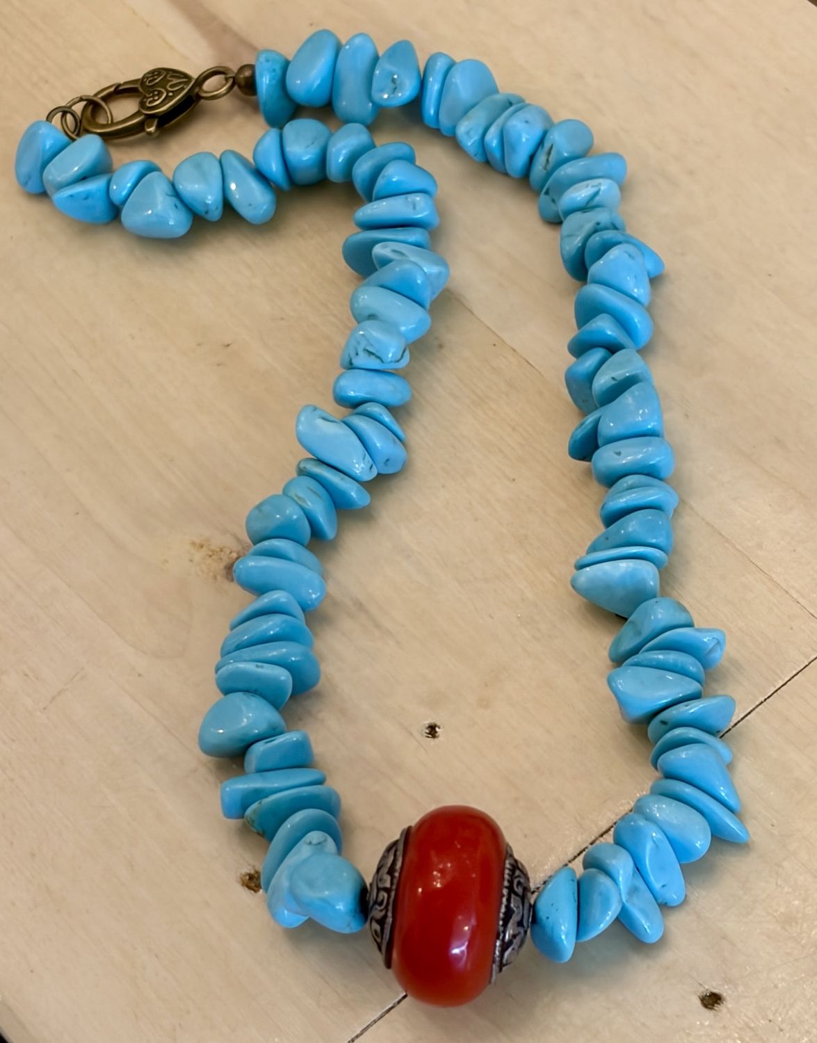 Turquoise Necklace with Coral Center