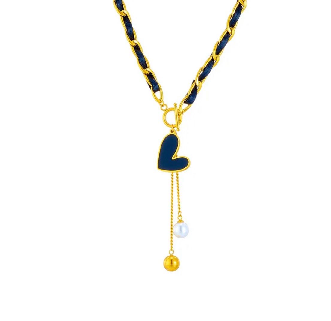 Gold Tone Toggle Necklace With Black Heart